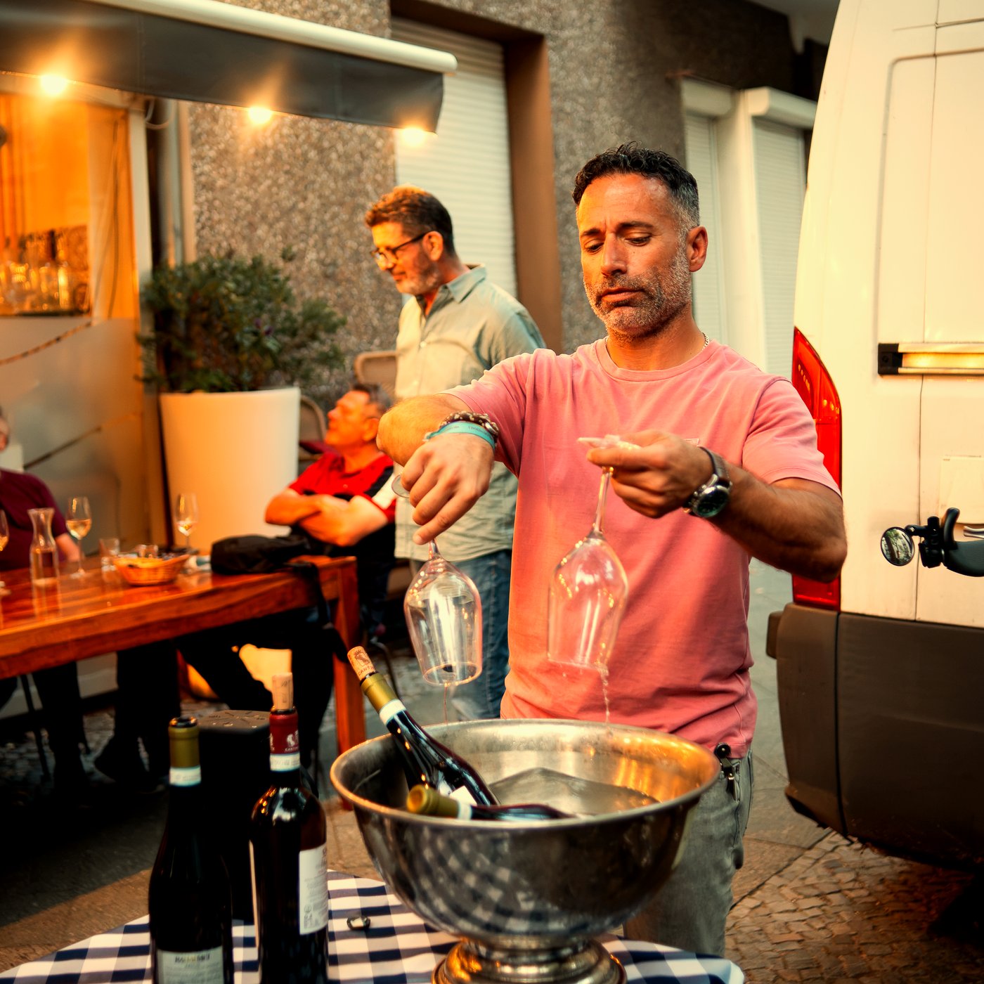 Pouring wine for guests at Modi Berlin