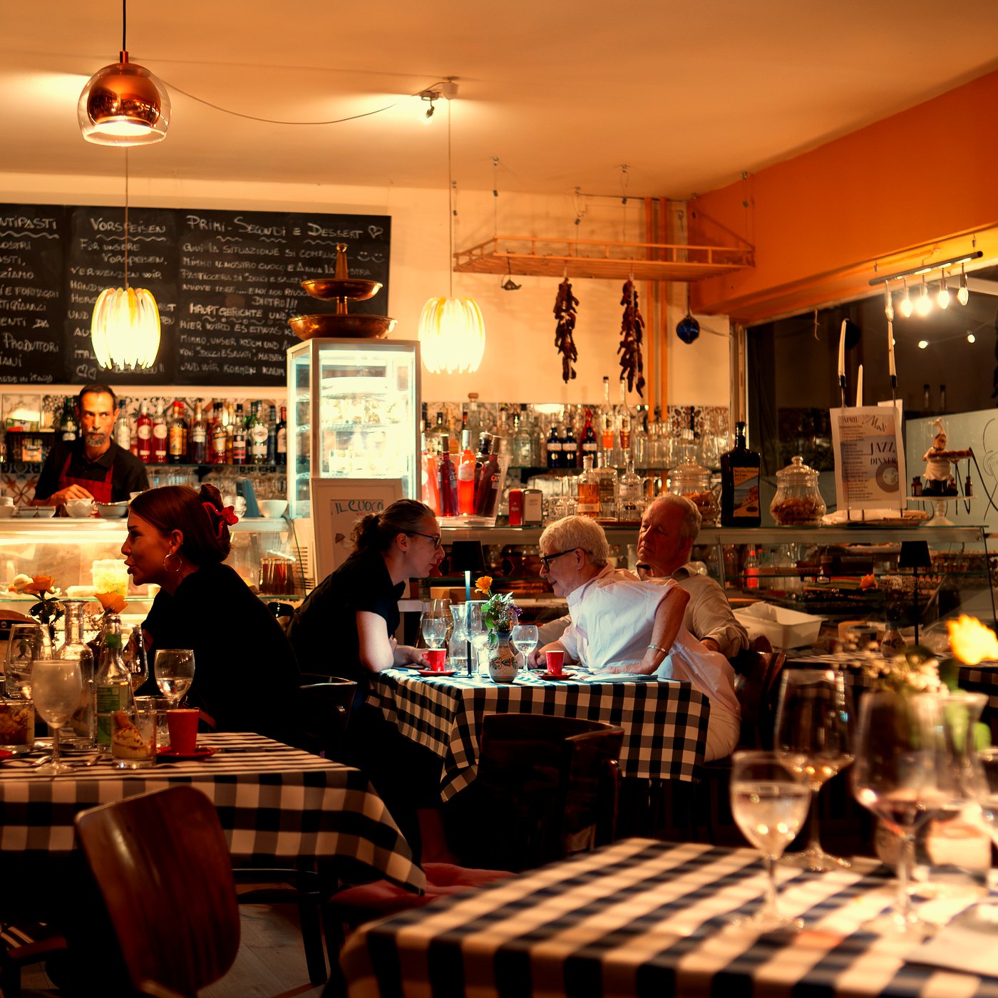 The candlelit dining room at Modi Berlin