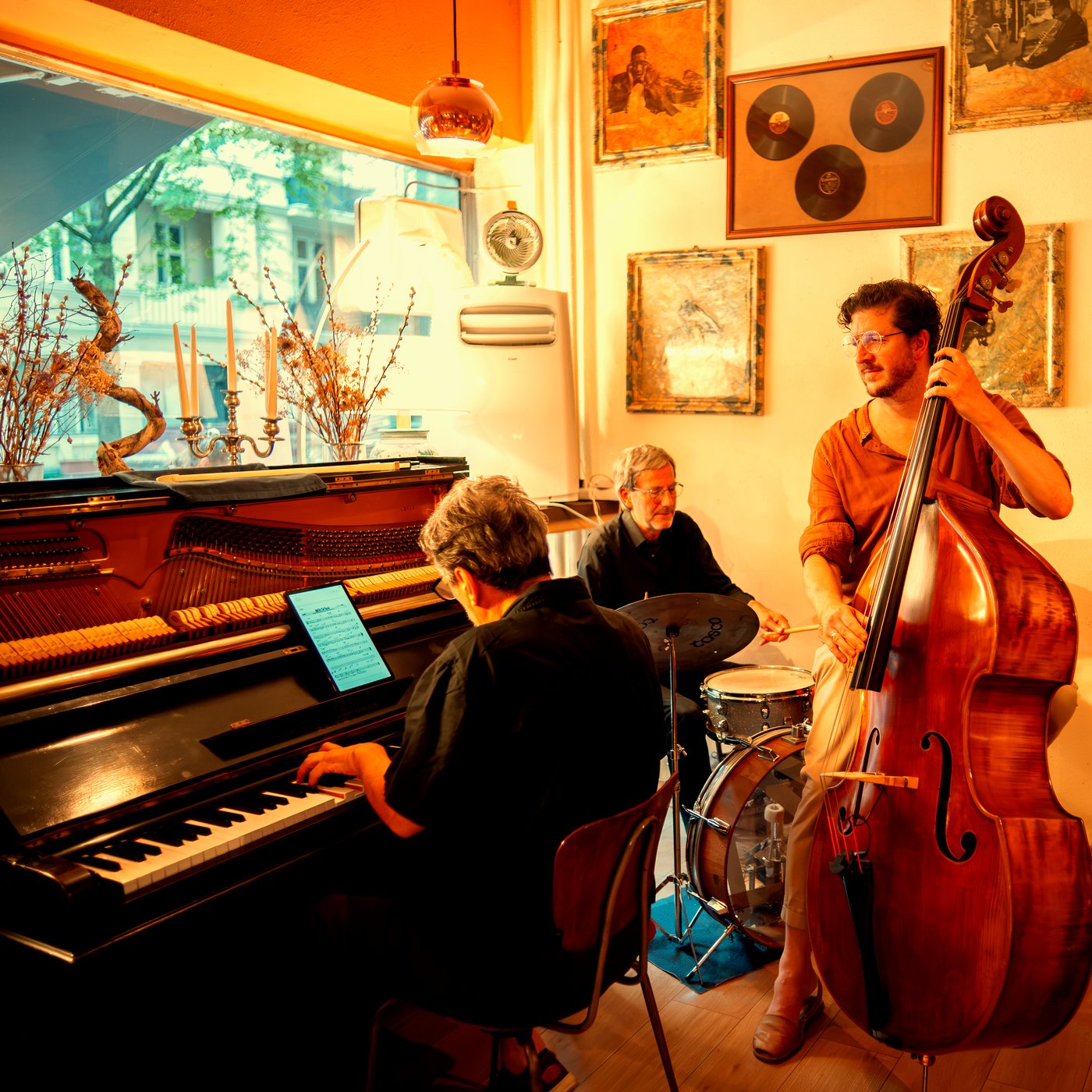 The trio playing to the room at a Modi evening