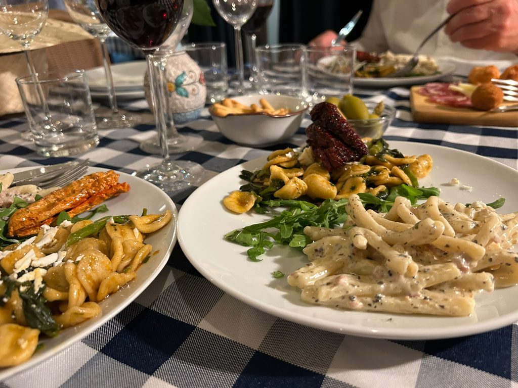 Plates of handmade pasta on the table at a Modi evening